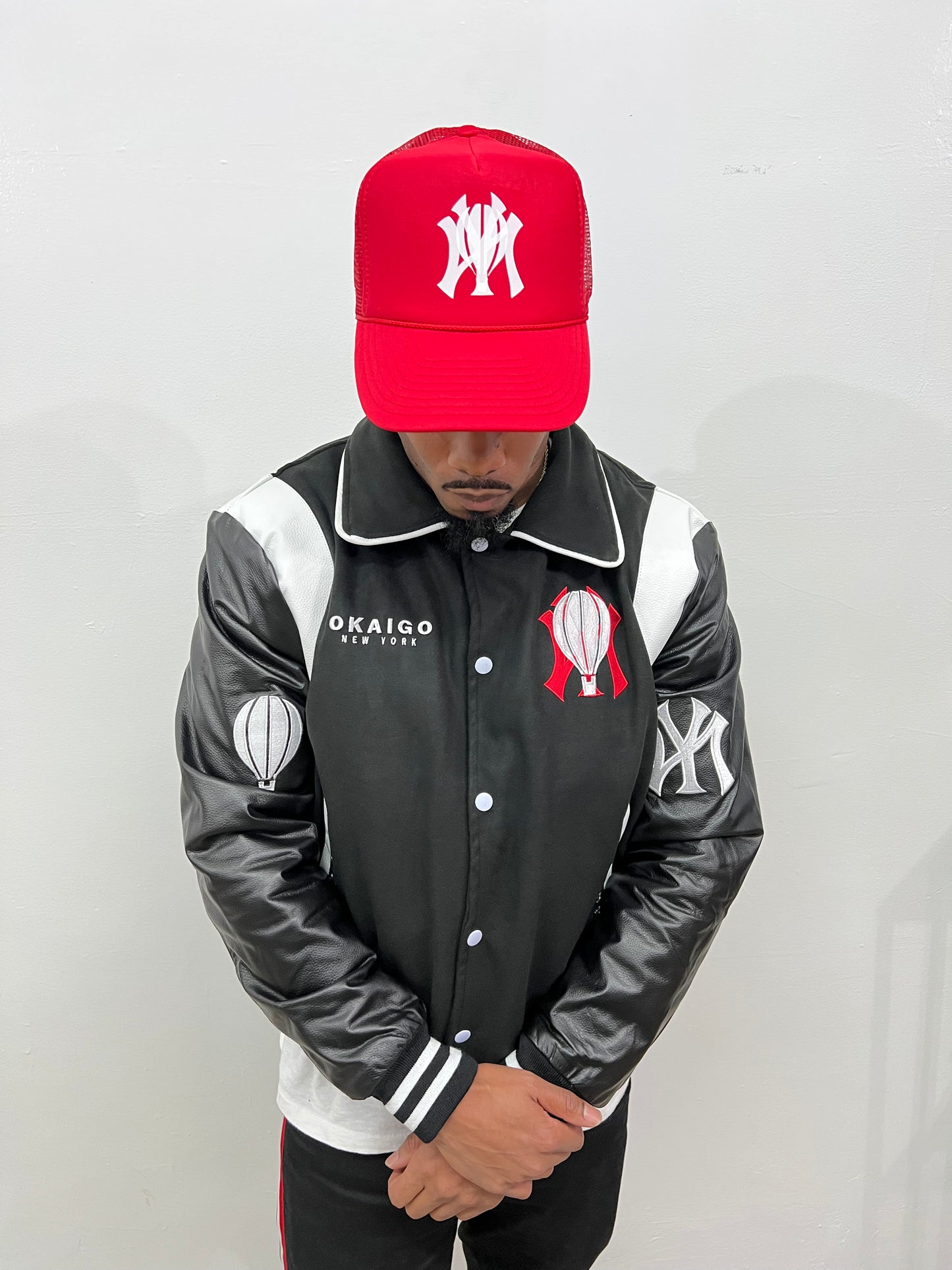 Red NYxO Trucker Hat