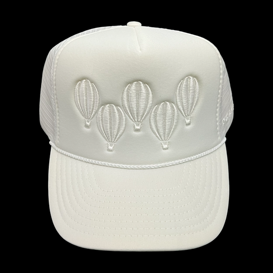 Triple White Trucker hat